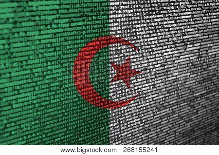 Algeria Flag  Is Depicted On The Screen With The Program Code. The Concept Of Modern Technology And 