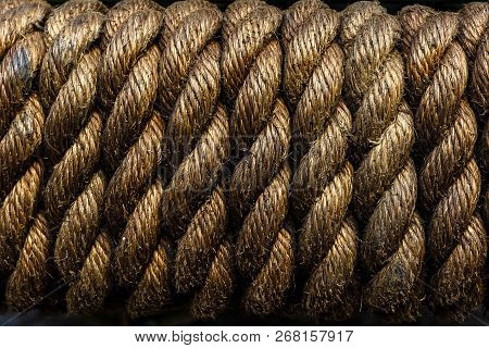 Texture Of Tightly Wound Rope Close-up. Low Key. Ideal For Background. Periodicity, Repetition, Rhyt