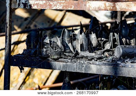 Close Up Damaged Supermarket Glass Plastic Bottles After Arson Fire With Burn Black Dark Debris Afte