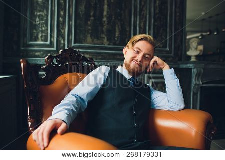 Portrait Of Blonde Young Man With Uncommon Appearance Wears White T Shirt.