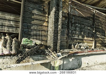 Close Up Damaged Supermarket Glass Plastic Bottles After Arson Fire With Burn Black Dark Debris Afte