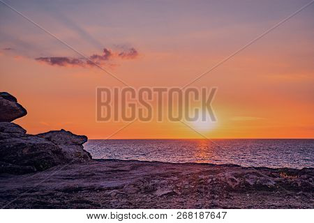 Sunset In Saint-guenole In Brittany At The Famous Granite Rocks In Penmarch