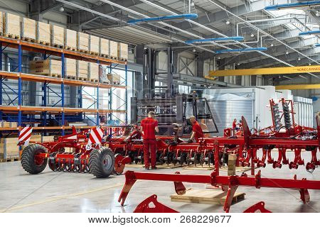 Roshchinsky, Russia - June 21, 2018: Plant For The Production Of Agricultural Machinery. Workers Mak