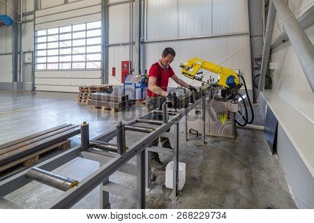 Roshchinsky, Russia - June 21, 2018: Plant For The Production Of Agricultural Machinery. Worker Make