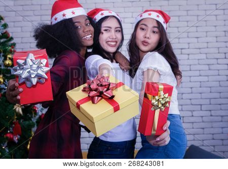 Christmas And Happiness Concept - Smiling Sandy Girl Holding Many Gift Boxes.
