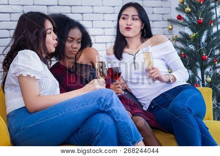 Closeup Photo Of Cheerful Girls Celebrating A Party At Home With Campaign.