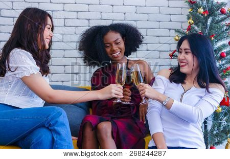 Closeup Photo Of Cheerful Girls Celebrating A Party At Home With Campaign.