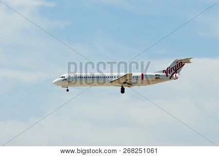 Perth, Australia - November 9, 2018: Landing Of Commercial Fokker 100 Airplane Belonging To Virgin A
