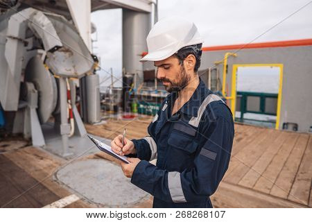 Marine Deck Officer Or Chief Mate On Deck Of Vessel Or Ship
