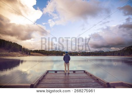 Man on mountains lake