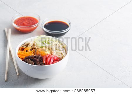 Traditional Asian Bibimbap Dish With Rice And Vegetables