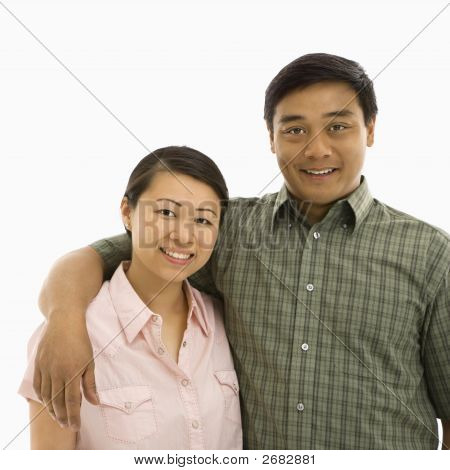 Asiatische paar lächelnd.