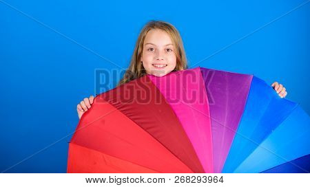 Brighten Up Life. Kid Peek Out Colorful Rainbow Umbrella. Color Your Life. Girl Cheerful Hide Behind