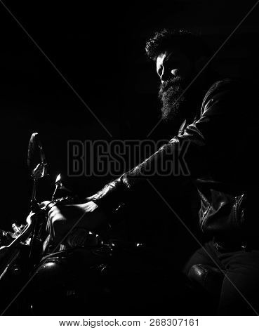 Hipster, Brutal Biker In Leather Jacket Riding Motorcycle At Night Time, Copy Space. Man With Beard,