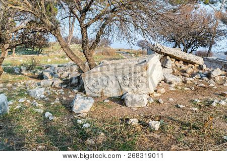 The Remains Of The Column On The Ruins Of The Destroyed Roman Temple, Located In The Fortified City 