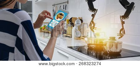 Smart Handy Dexterous Chef Robotic Assistant In Kitchen Technology Concept, Robot Hand Receive An Or