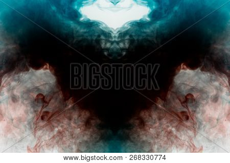 Mystical Pattern Of Multicolored Smoke Of Red And Blue In The Shape Of A Raven With Open Wings Of Bl