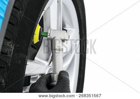 Car Polish Wax Worker Hands Polishing Wheel. Buffing And Polishing Car Disk. Car Detailing. Man Hold