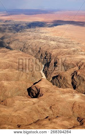 Beautiful Landscape Of The Kuiseb Canyon In Namib Desert At Sunset. Flying On A Small Plane Over The