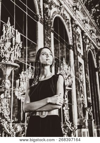 Beautiful Woman In Mirror's Hall Of Versailles Castle.