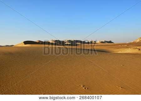 Sahara Desert Beautiful Landscape Nearby Dakhla Oasis In Egypt At Sunset. Africa
