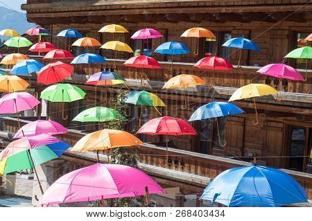 Multi Color Umbrellas Floating In Werfenweng, Austria