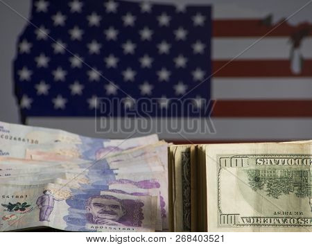 The Dream Of Traveling To The United States- Colombia And Dollars With American Flag In The Backgrou