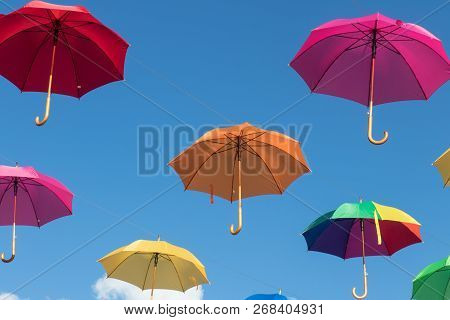 Multi Color Umbrellas Floating In Werfenweng, Austria