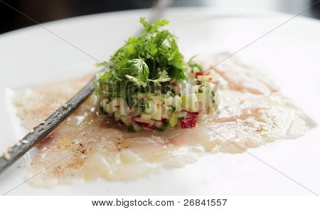Carpaccio di branzino con tartare di verdure