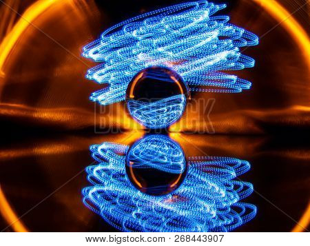 Creative Light Painting Technique Is Used To Create The Illusion Of Wings Moving With A Halo Cloud O