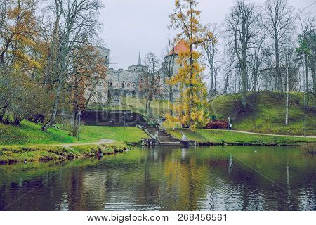 Old Casttle Park At Autumn. Yellow Leafs, Castle And Architecture. Travel Photo 2018.