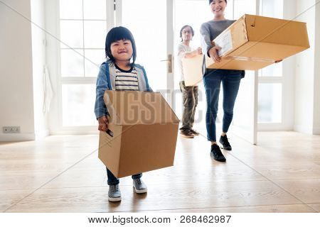 Asian family emoving to new house