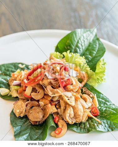 Crispy fish maw and dried shrimp in spicy salad