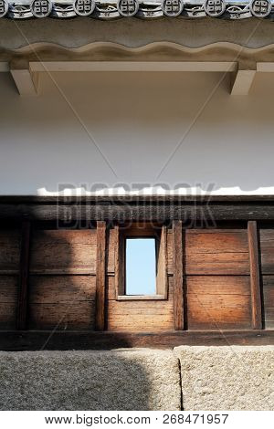 Kagawa, Japan - November 28, 2018: The Walls Of Japanese Castle. The Holes Are For Shooting Gun And 