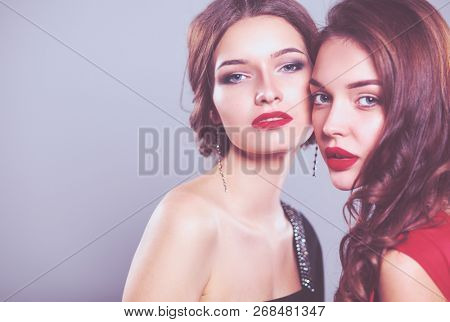 Two young beauty women standing together . Two young beauty wome
