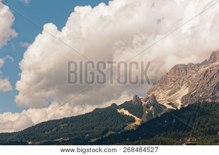 Panoramic View Of The Dolomite Mountains. Mountain Village Cortina Di Ampezzo.