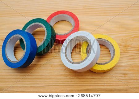 Color Rolls Of Gaffer Tape, Duct Tape, On A Wood Background