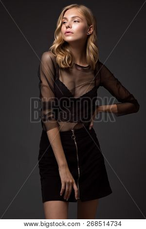 Fashion Model With Long Hair, Perfect Skin Is Posing In Studio For Glamour Test Photo Shoot Showing 