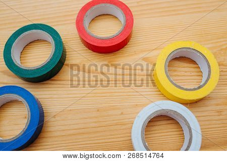Color Rolls Of Gaffer Tape, Duct Tape, On A Wood Background