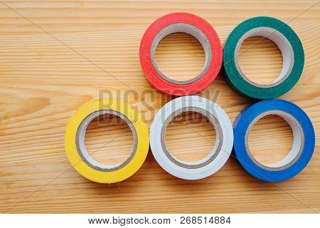 Color Rolls Of Gaffer Tape, Duct Tape, On A Wood Background