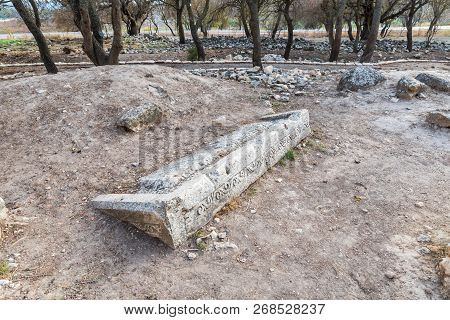 The Remains Of The Column On The Ruins Of The Destroyed Roman Temple, Located In The Fortified City 
