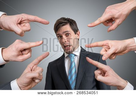 Many Hands Are Pointing On Guilty Man And Blame Him.