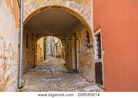 An Archway Crossing A Small Street In The Hill Village Of Groznjan (also Called Grisignana) In Istri
