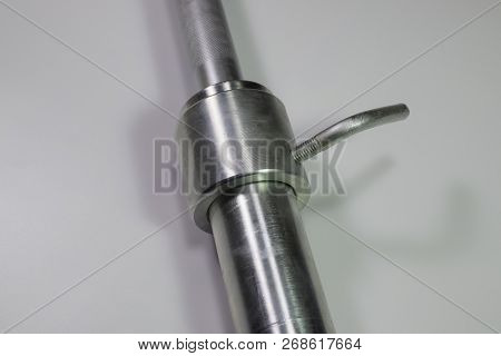 Grif Rod With A Lock On White Background. Sport Shells.