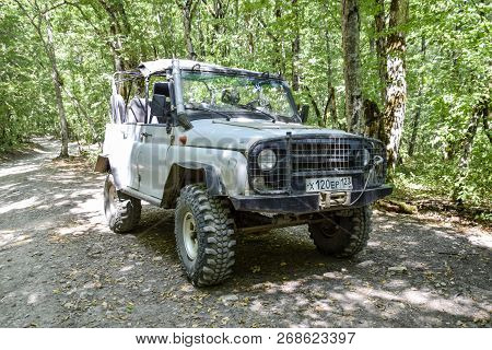Shapsugskaya, Russia - June 30, 2017: Suv In The Forest. Transport For Hilly And Mountainous Terrain