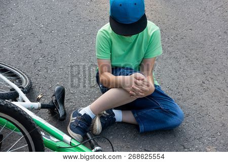 fell down of his first bike on road.