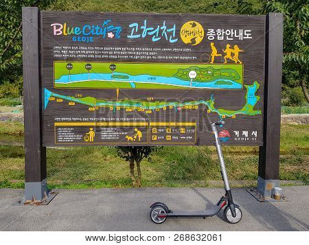 Geoje, South Korea - October 14, 2018 : Ninebot By Segway Es2 Kickscooter Park In The Bicycle Path I