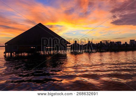 Beautiful Twilight Sunrise With Silhouette Floating Resort In Semporna, Sabah, Borneo (image Contain