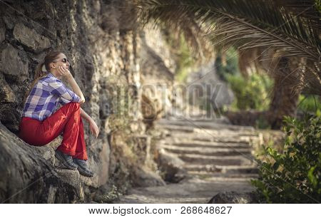 Hiker In An Old Omani Garden In An Old Village Of Misfat Al Abriyeen