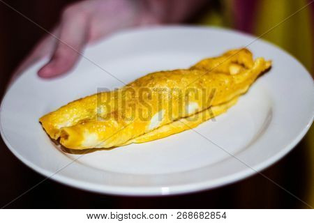 Brizol From Spam And Eggs On A White Plate. Meat Dish. French Menu.
